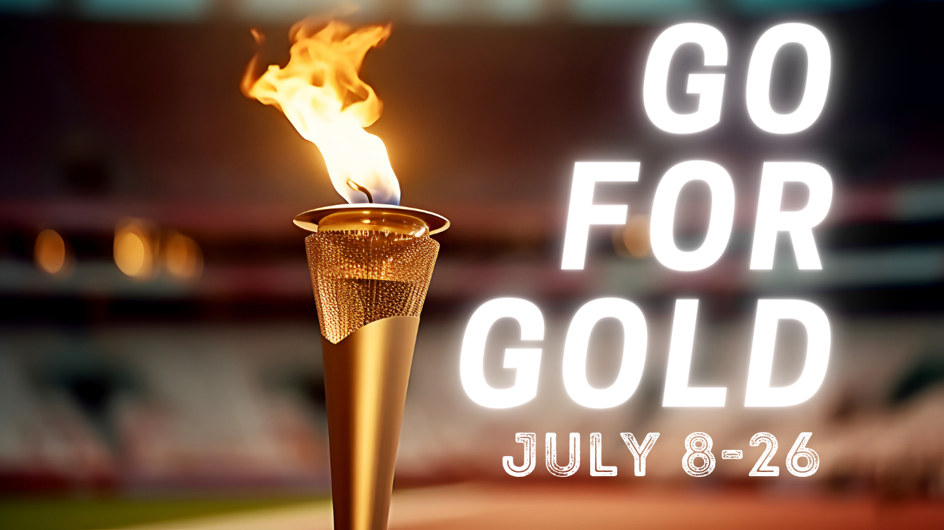 Blurred image with Go For Gold July 8-26 written in white on the ride hand side of image. In the middle there's an Olympic torch with a flame