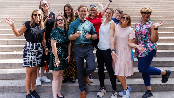 group of employees celebrating national walking day