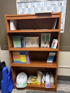 book shelf with items to donate