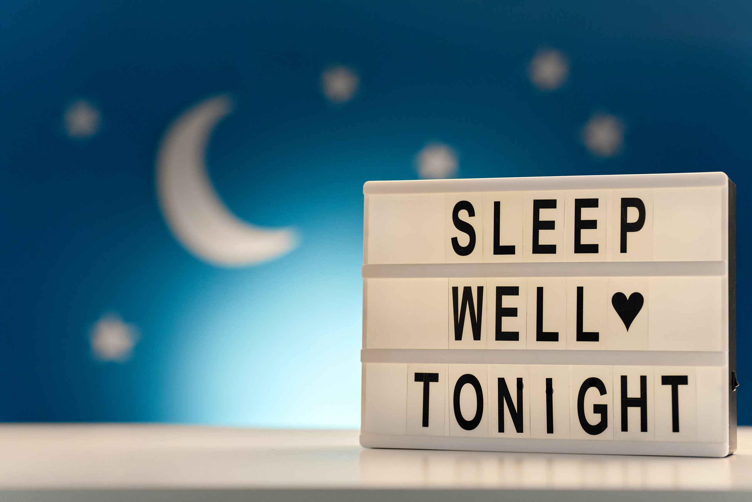 light box with sleep well tonight words at night